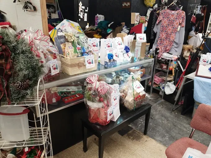 indoor shelves at quakertown farmers market packed with a variety of vintage toys, figurines, and small household collectibles.